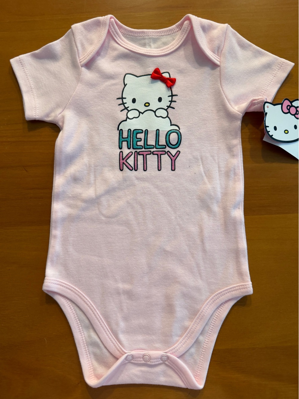 NWT Hello Kitty light pink onesie (24 months)